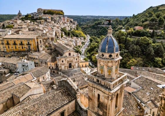 Ragusa Ibla and the blue tiled dome up close with drone