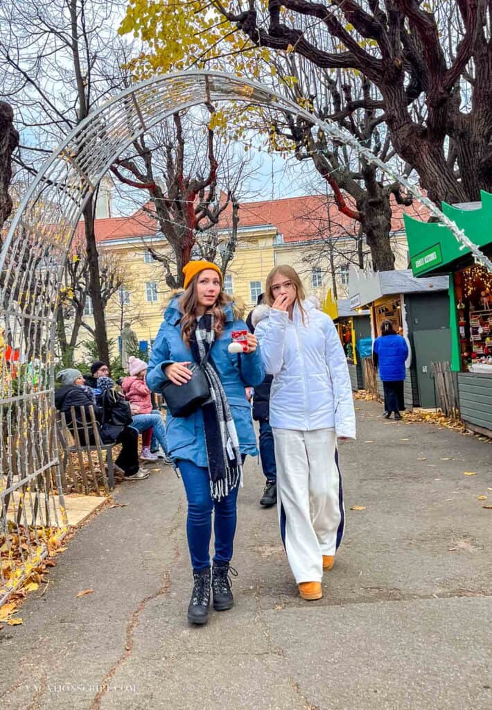 ashley and devyn walking together through the Altes AKH Market
